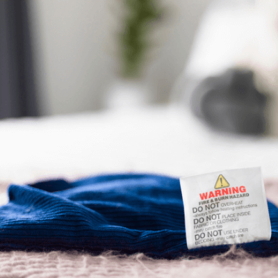 Close up of warning label on a wheat bag heat pack